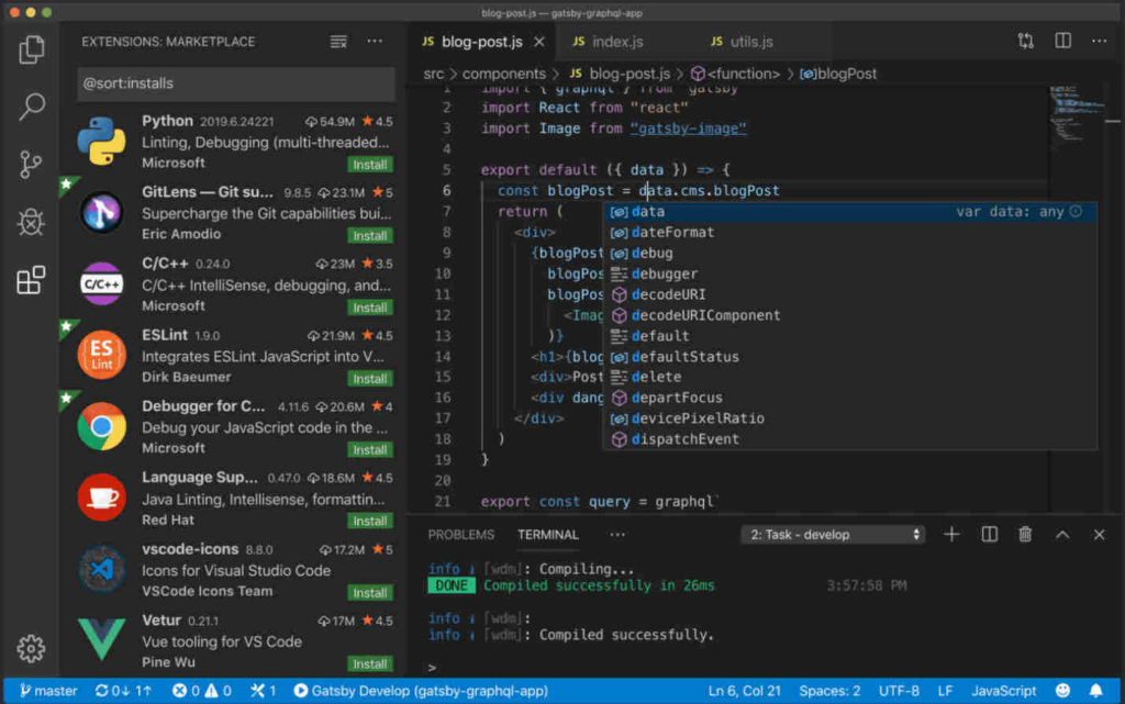 A screenshot of the Visual Studio Code environment, showing the Extensions Marketplace on the left and a JavaScript file being edited on the right, below which is shown a terminal panel indicating code has been successfully compiled. The editor is also showing an autocomplete list of possible syntax to insert. The bottom of the screen is a status bar showing additional information about the currently opened files.